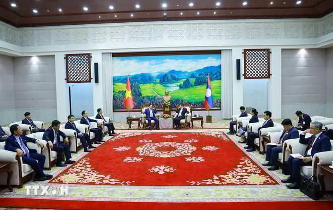 ttxvn-0312-prim-ministrul-întâlnește-prim-ministrul-bi-thu-chu-ch-nuoc-lao-4.jpg