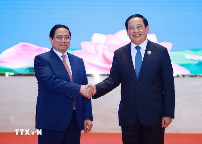 ttxvn-0312-minister-of-the-joint-government-committee-of-vietnam-lao-6.jpg