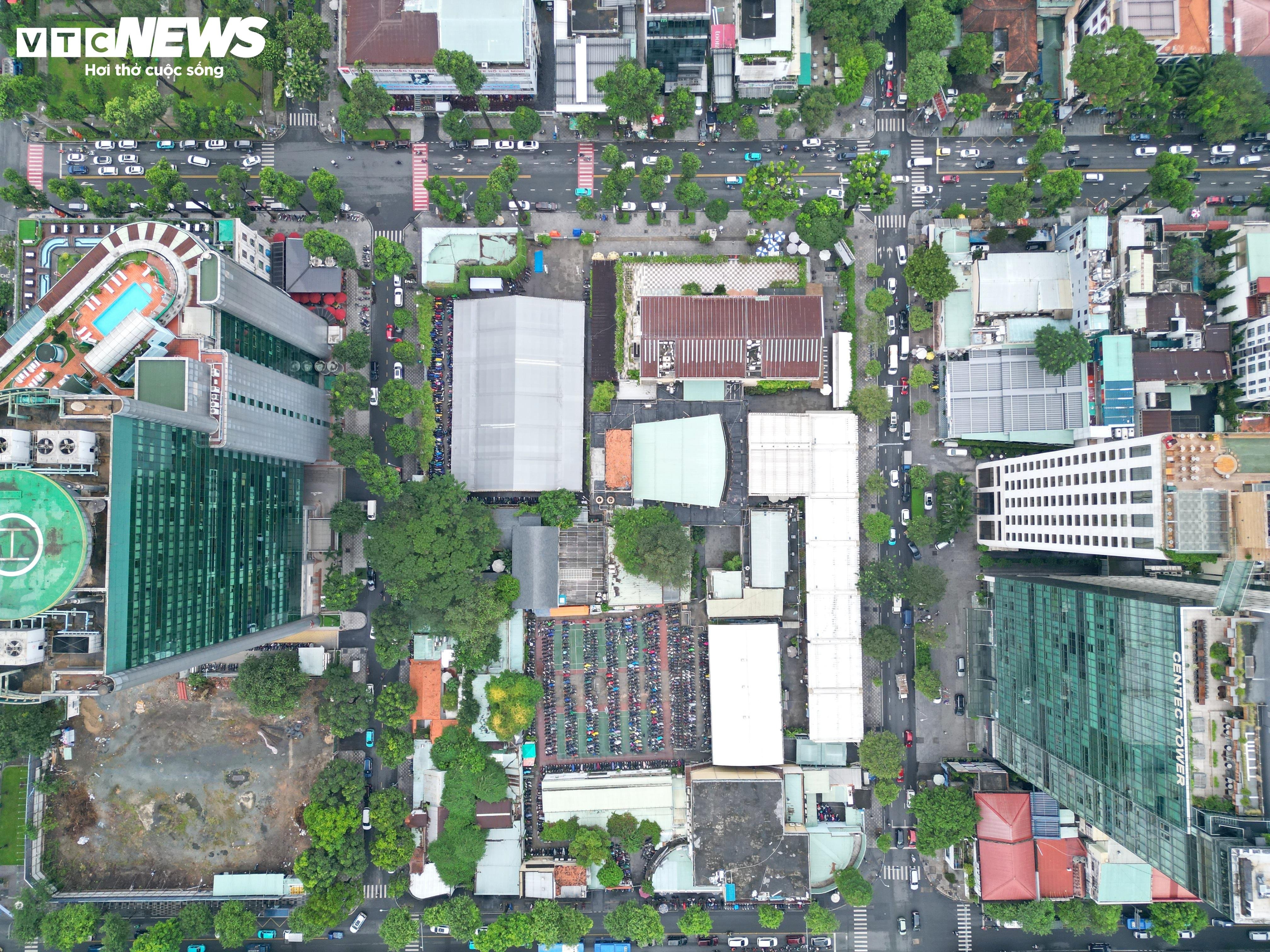 ພາບບັນຍາກາດການກໍ່ສ້າງເຮືອນວັດທະນະທຳຊາວໜຸ່ມ 25 ຊັ້ນ ໃຈກາງນະຄອນໂຮ່ຈິມິນ - 1