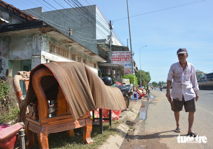 Nước lũ vẫn ngập sâu nhiều vùng Bình Thuận cũ - Ảnh 9.