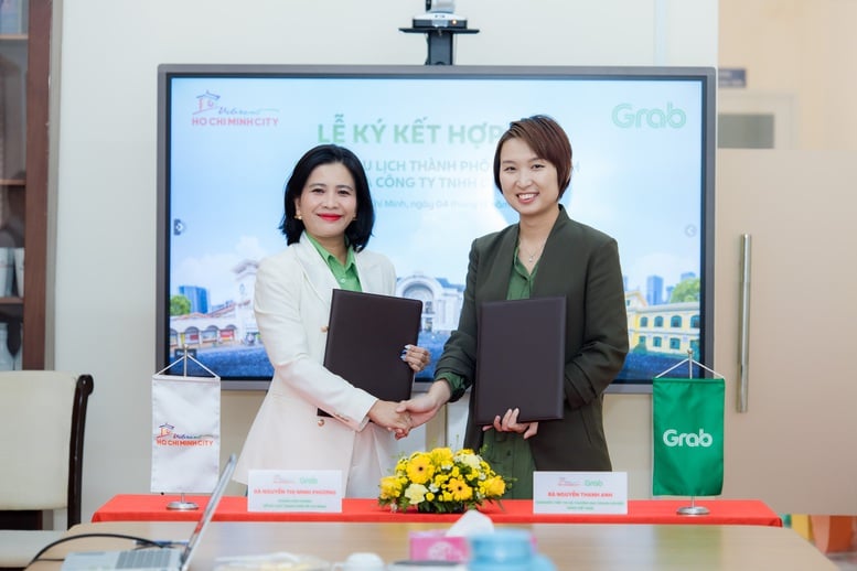 Sở Du lịch TP.HCM và Grab Việt Nam hợp tác thúc đẩy du lịch- Ảnh 1.
