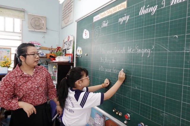 Học sinh tiểu học tại TP Hồ Chí Minh trong một giờ học tiếng Anh        Ảnh: Đào Ngọc Thạch