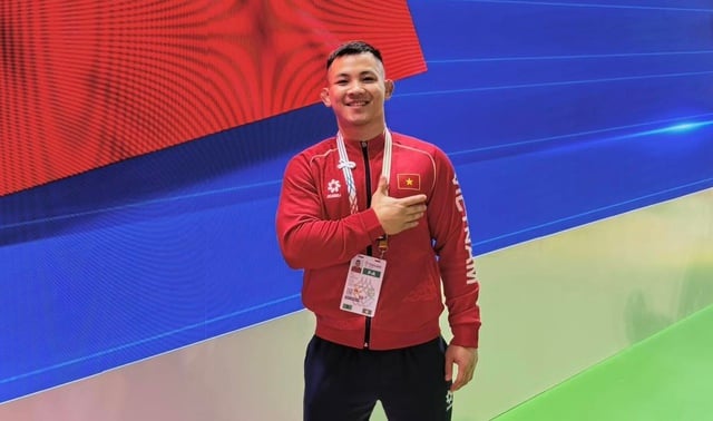 Võ sĩ ‘tí hon’ 1,49m Đào Hồng Sơn: Niềm hy vọng vàng SEA Games và thử thách 'trái nghề'- Ảnh 1.