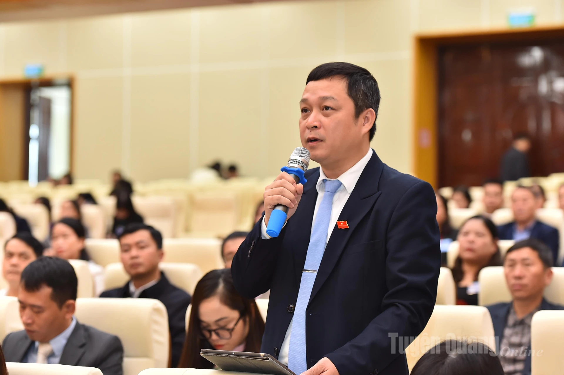 Delegaten Mai Quang Thang talade vid mötet.