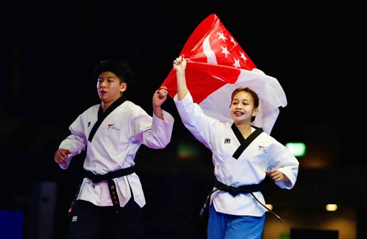 SEA Games 33 ngày 10-12: Taekwondo mang về cho Việt Nam huy chương bạc đầu tiên - Ảnh 1.