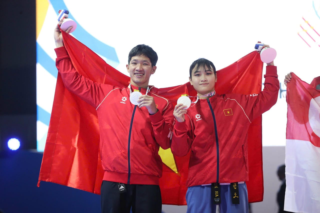 La dupla Nguyen Trong Phuc y Nguyen Thi Kim Ha se llevó la primera medalla de plata para la delegación deportiva vietnamita. (Fuente: Delegación Deportiva de Vietnam)