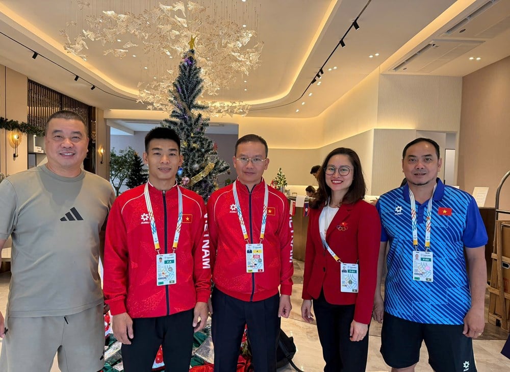 The head of the Vietnamese sports delegation encourages the MMA team - photo 1