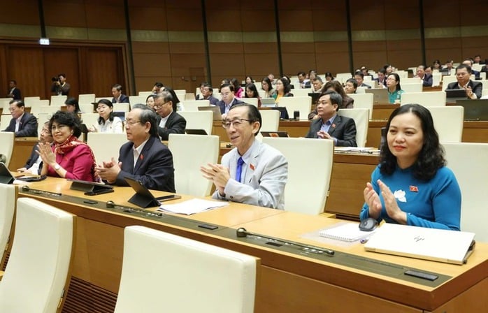 Ulusal Meclis, Ho Chi Minh Şehri için bir dizi özel mekanizma getiren 98 sayılı Karara yapılan değişiklikleri ve eklemeleri onayladı - Fotoğraf 2.