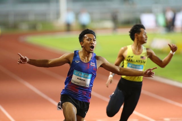 Thailändskt friidrottsunderbarn skriver historia vid SEA Games - Foto 2. Thần đồng điền kinh Thái Lan đi vào lịch sử SEA Games- Ảnh 2.