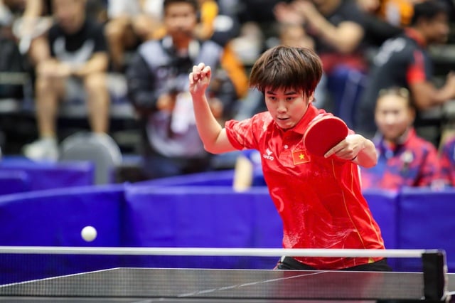 Vietnamese table tennis team unable to spring a surprise against defending champions Thailand and Singapore - Photo 3. Bóng bàn Việt Nam không thể gây bất ngờ trước đương kim vô địch Thái Lan, Singapore- Ảnh 3.