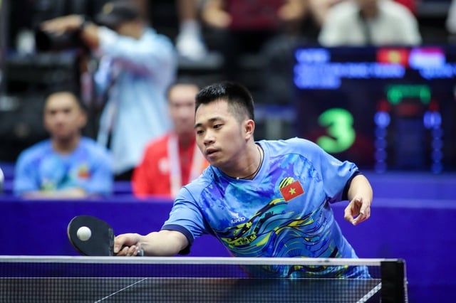 Vietnamese table tennis team unable to spring a surprise against defending champions Thailand and Singapore - Photo 7. Bóng bàn Việt Nam không thể gây bất ngờ trước đương kim vô địch Thái Lan, Singapore- Ảnh 7.