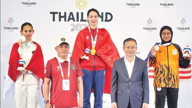 Karatistka Dinh Thi Huong úspěšně obhájila zlatou medaili v kategorii kumite žen do 68 kg.