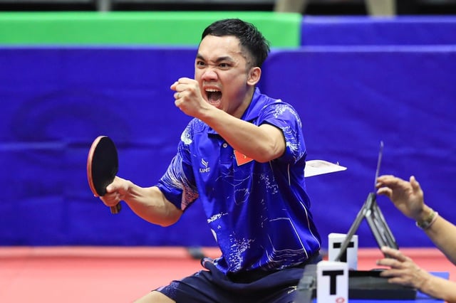 ក្រុមវាយកូនឃ្លីលើតុវៀតណាមបង្ហាញទម្រង់លេងយ៉ាងល្អឥតខ្ចោះ ដោយឡើងដល់វគ្គផ្តាច់ព្រ័ត្រស៊ីហ្គេមបន្ទាប់ពីខកខាន ៨ ឆ្នាំ - រូបថតទី ៣។ Bóng bàn Việt Nam thi đấu thăng hoa, vào chung kết SEA Games sau 8 năm- Ảnh 3.