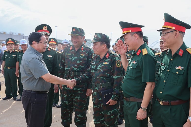 ນາຍົກລັດຖະມົນຕີ: ສະໜາມບິນລອງແທ່ງຈະຕ້ອນຮັບຖ້ຽວບິນທຳອິດຢ່າງເປັນທາງການໃນວັນທີ 19 ທັນວາ - ຮູບທີ 1. Thủ tướng: Sân bay Long Thành sẽ đón chuyến bay chính thức đầu tiên vào 19/12- Ảnh 1.