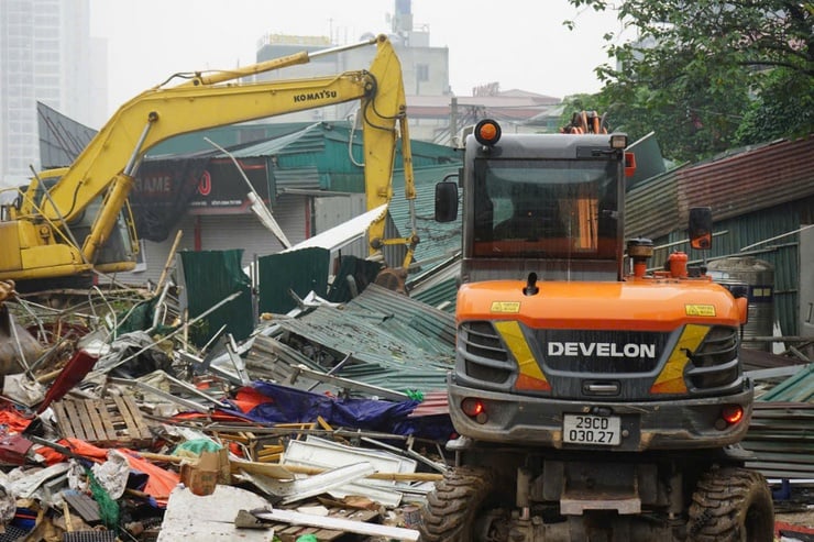 ຫວອດດິ່ງກົງ: ການບຸກເບີກທີ່ດິນສຳລັບໂຄງການເສັ້ນທາງວົງແຫວນ 2.5 ໂດຍພື້ນຖານແລ້ວແມ່ນສຳເລັດແລ້ວ - ຮູບທີ 2. Phường Định Công: Cơ bản hoàn thành giải phóng mặt bằng dự án đường Vành đai 2,5- Ảnh 2.