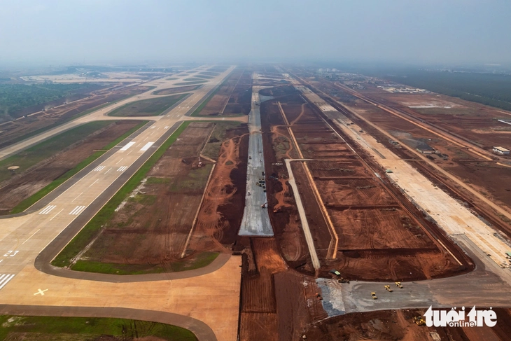 ឡុង ថាញ - រូបថតទី ៩។