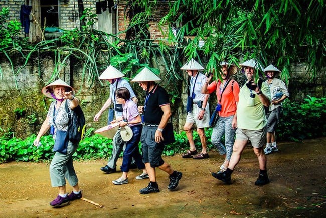 ឡាំដុង៖ ការអភិវឌ្ឍទេសចរណ៍នៅក្នុងភូមិសិប្បកម្មប្រពៃណីរួមចំណែកដល់ការលើកកម្ពស់គុណភាពជីវិតជនបទ និងកាត់បន្ថយភាពក្រីក្រសម្រាប់ប្រជាជន - រូបថតទី ១។