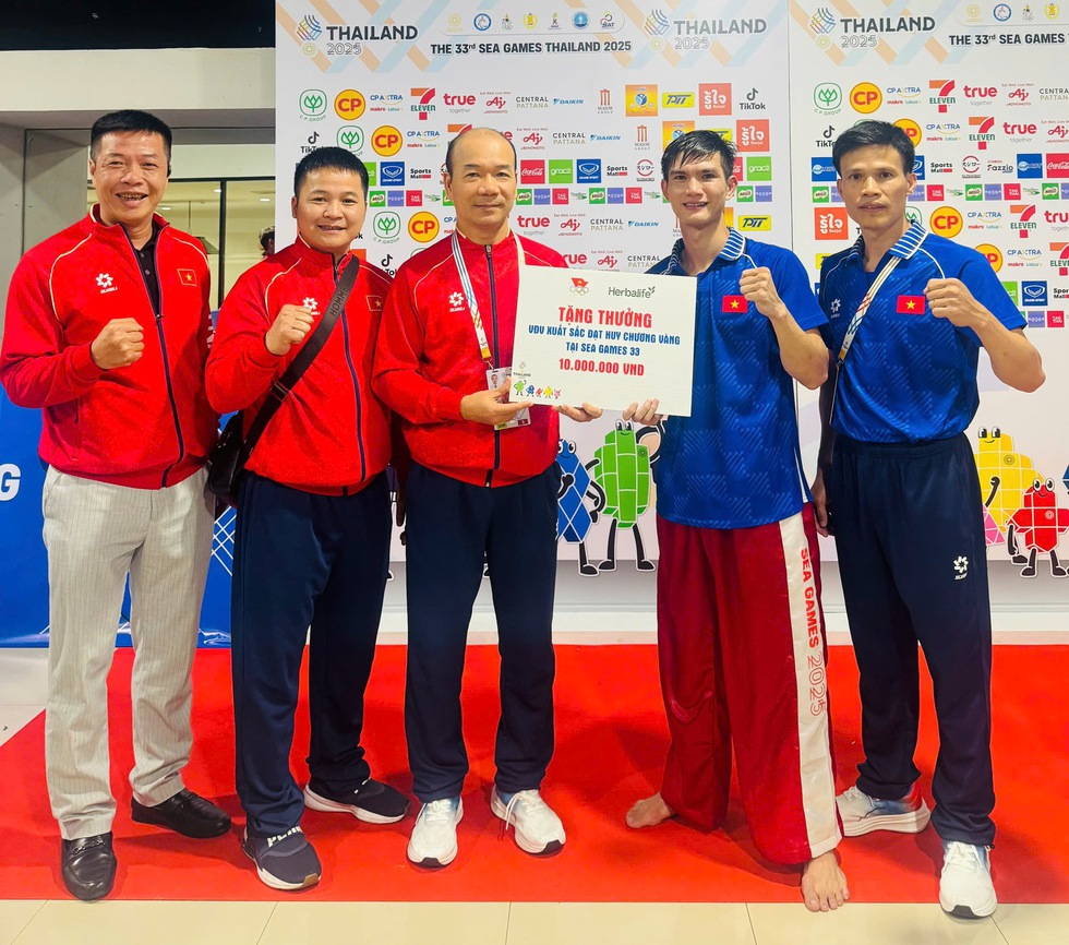 I combattenti di kickboxing vincono alla grande contro Thailandia e Myanmar: il Vietnam ora ha 46 medaglie d'oro, continuando la sua ascesa - Foto 5. Võ sĩ kickboxing thắng đậm Thái Lan và Myanmar: Việt Nam đã có 46 HCV, tiếp tục bứt phá- Ảnh 5.