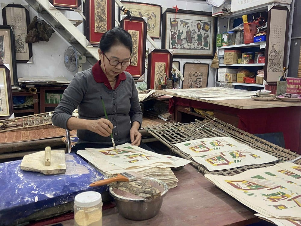 ความสุขและความรู้สึกในการสร้างสรรค์ภาพวาดพื้นบ้านดงโฮ - ภาพที่ 2