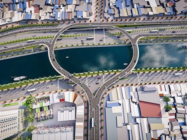 A perspective view of the Nguyen Khoai bridge and road, featuring a modern design with multiple lanes crossing the river.
