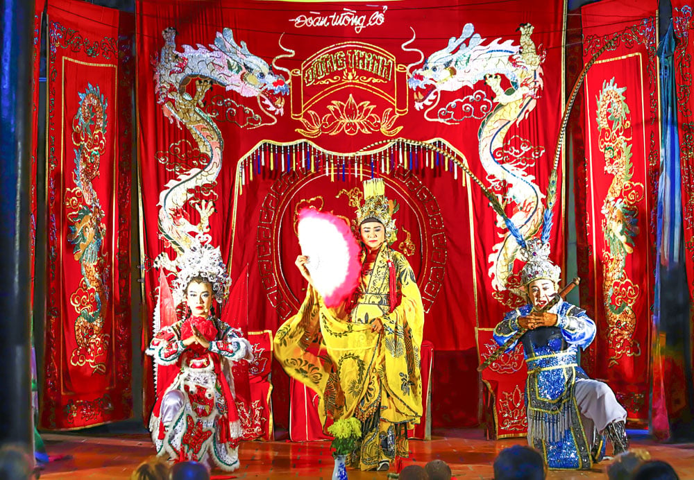 A scene depicting a traditional Vietnamese opera performance on stage.
