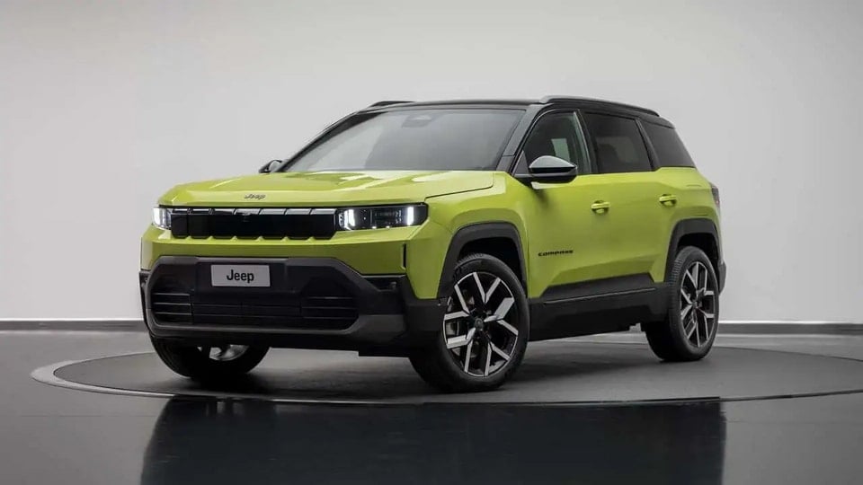ການອອກແບບພາຍນອກຂອງລົດ Jeep Compass ປີ 2026 ລຸ້ນໃໝ່ທັງໝົດມີກະจังໜ້າເຈັດຊ່ອງທີ່ໂດດເດັ່ນ ແລະ ປິດຜະນຶກເຂົ້າກັນໄດ້.