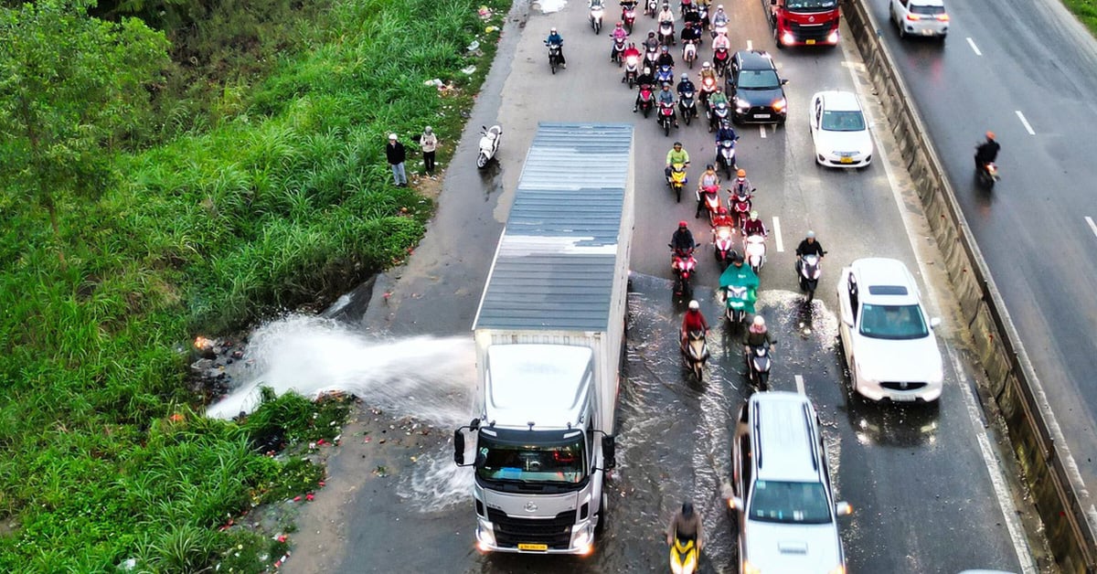 コンテナ運転手がバイクが高速道路を横断できるように水を遮断、賛辞の「シャワー」を浴びる