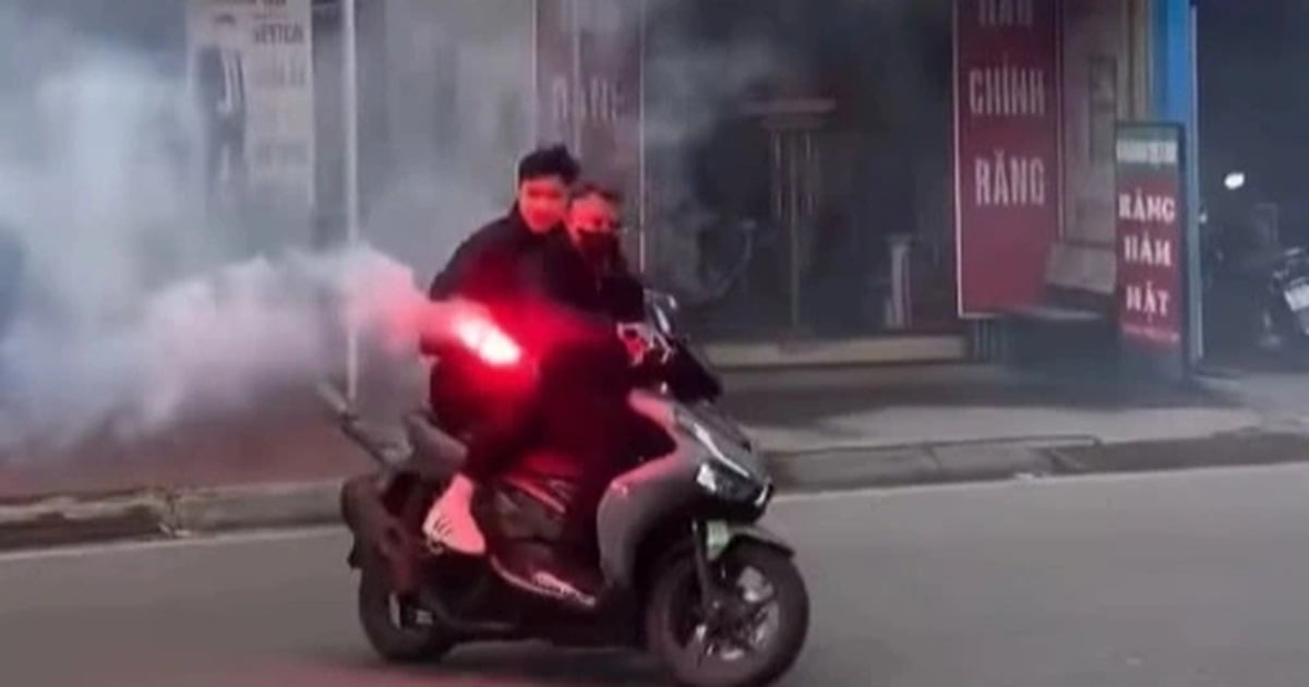 Verifying a group of young men riding motorbikes and lighting flares on the road