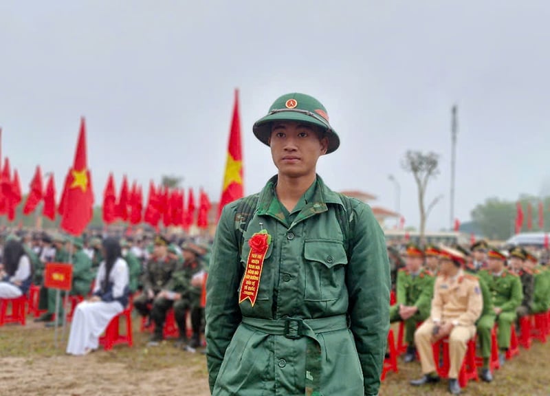 New recruit Ho An at the military handover point of Minh Hoa district.