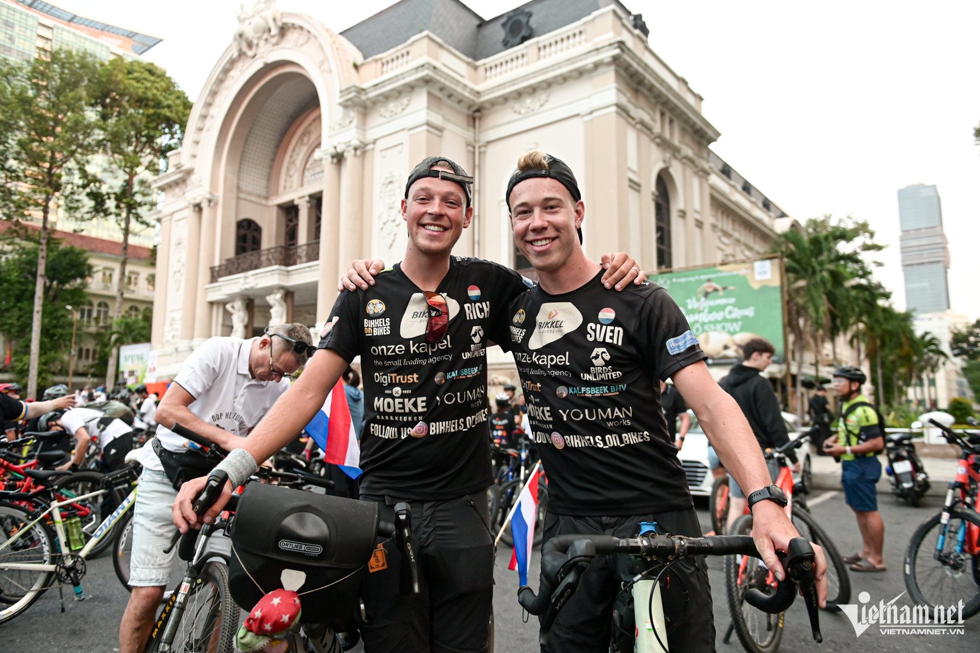 Two Western men cycled 20,000km from the Netherlands to Ho Chi Minh City to attend a special event.