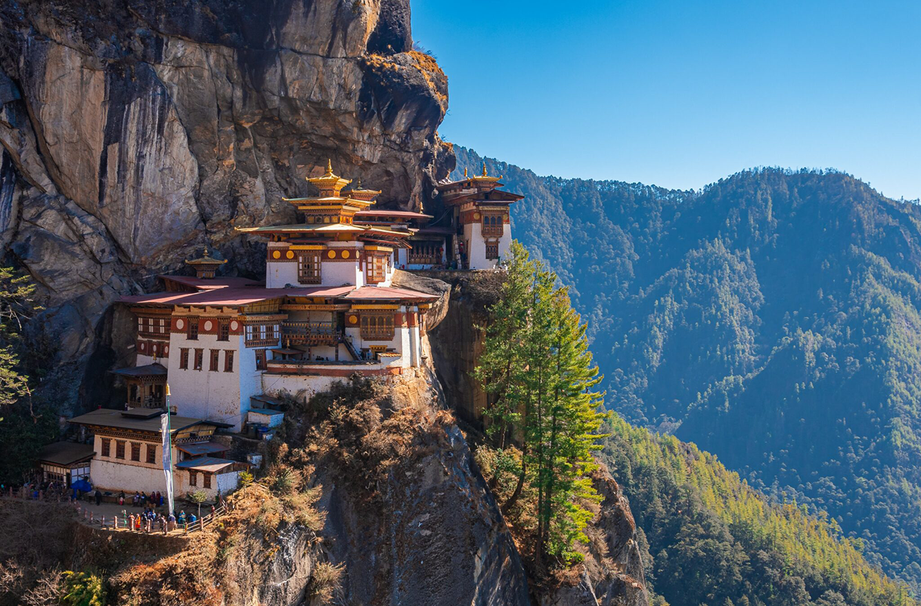 What experiences should not be missed in the capital Thimphu during a pilgrimage tour to Bhutan?