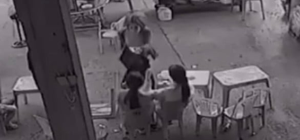 Clip of parent kicking female student in the face stirs up