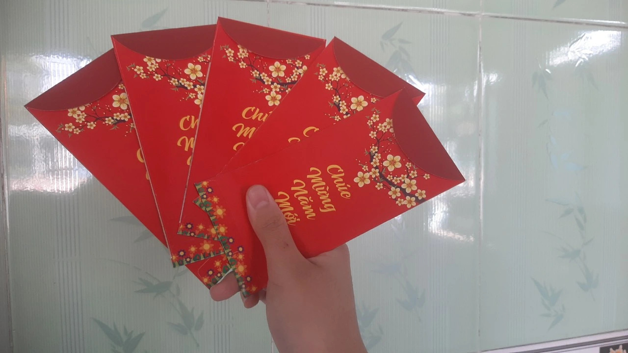 Để trẻ sử dụng tiền lì xì sau tết thế nào cho hợp lý?- Ảnh 1.