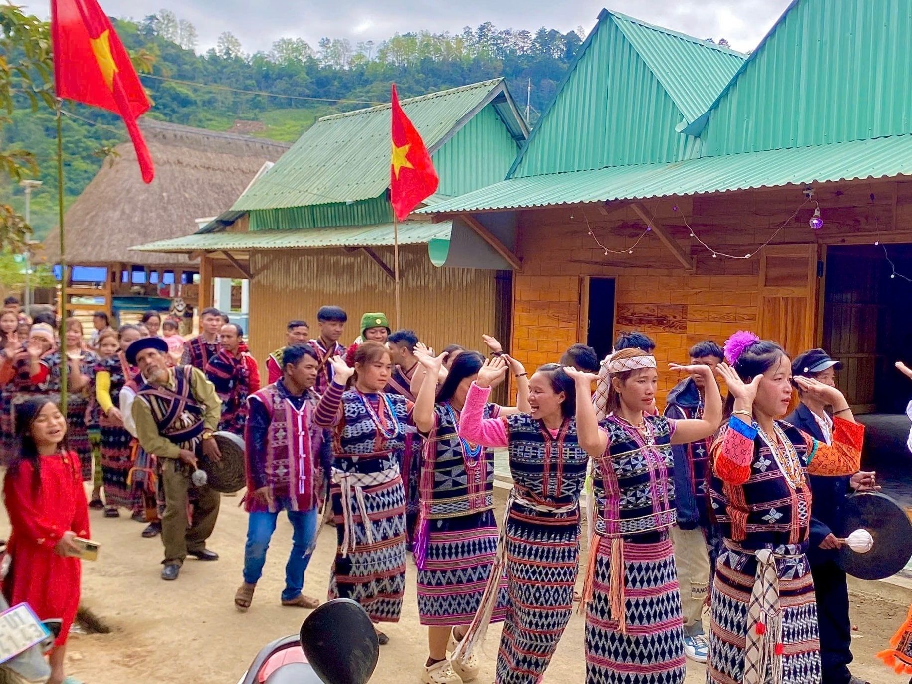 K'noonh villagers in traditional costumes welcome the new year 2025.
