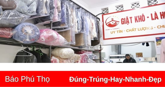 Dịch vụ giặt là “đắt khách” khi mưa phùn, nồm ẩm kéo dài