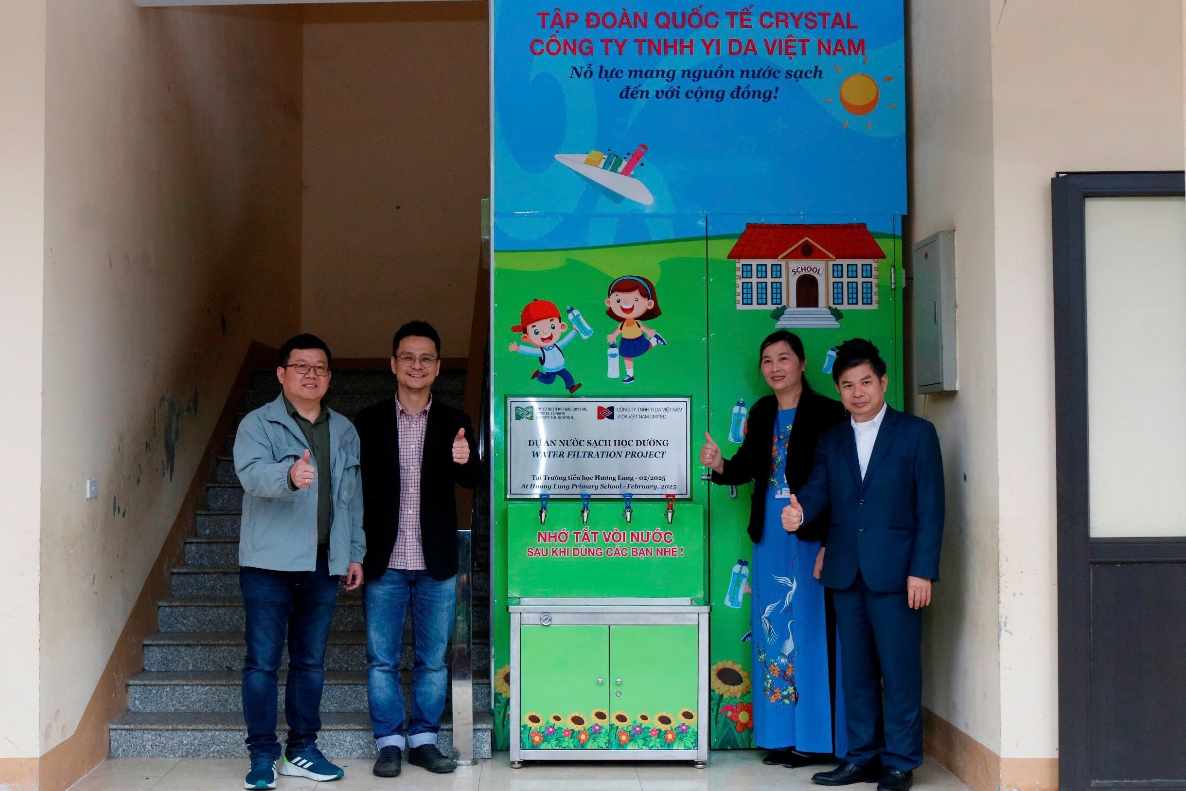 Handing over the toilet project and water filtration system to Huong Lung Primary School, Cam Khe district