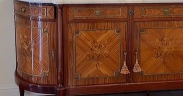 Woman buys cabinet online, shocked to discover what's inside