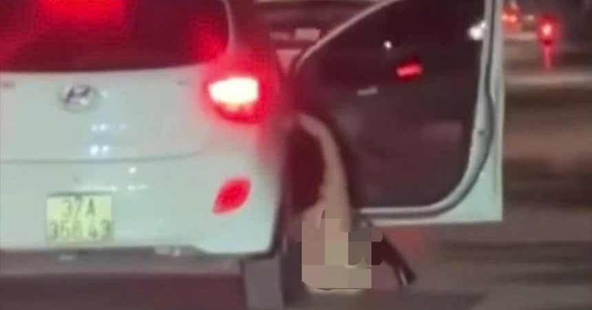 Stirring clip of girl falling out of car while it was running on the road