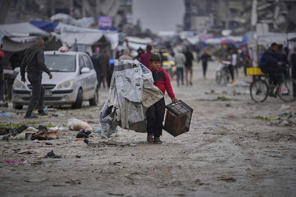 Gaza đối mặt thảm họa, Israel tấn công Syria - Ảnh 1.