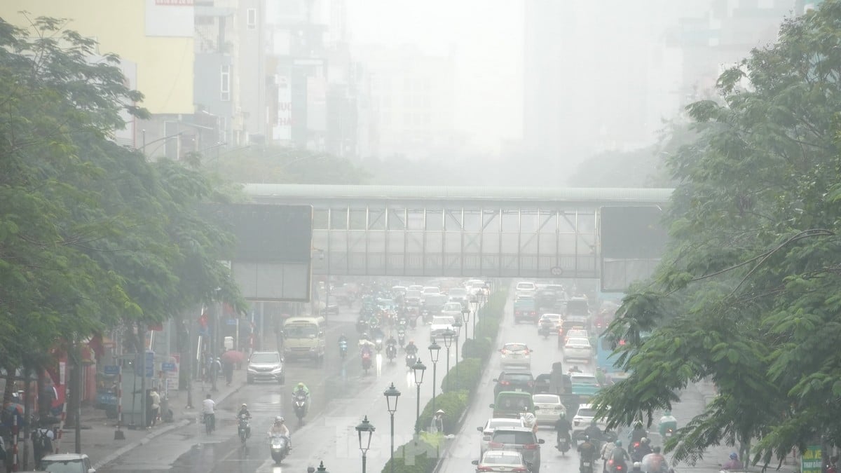 La vida de los hanoienses en un día lluvioso y húmedo (foto 10)