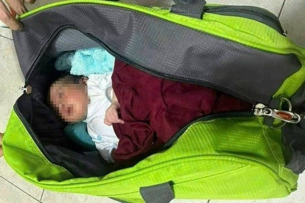 Newborn baby boy abandoned on lawn in Ho Chi Minh City