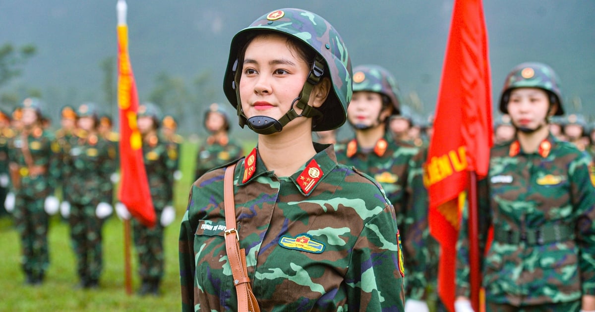 Beautiful female corporal in the ranks of the army's block commanders marching and marching