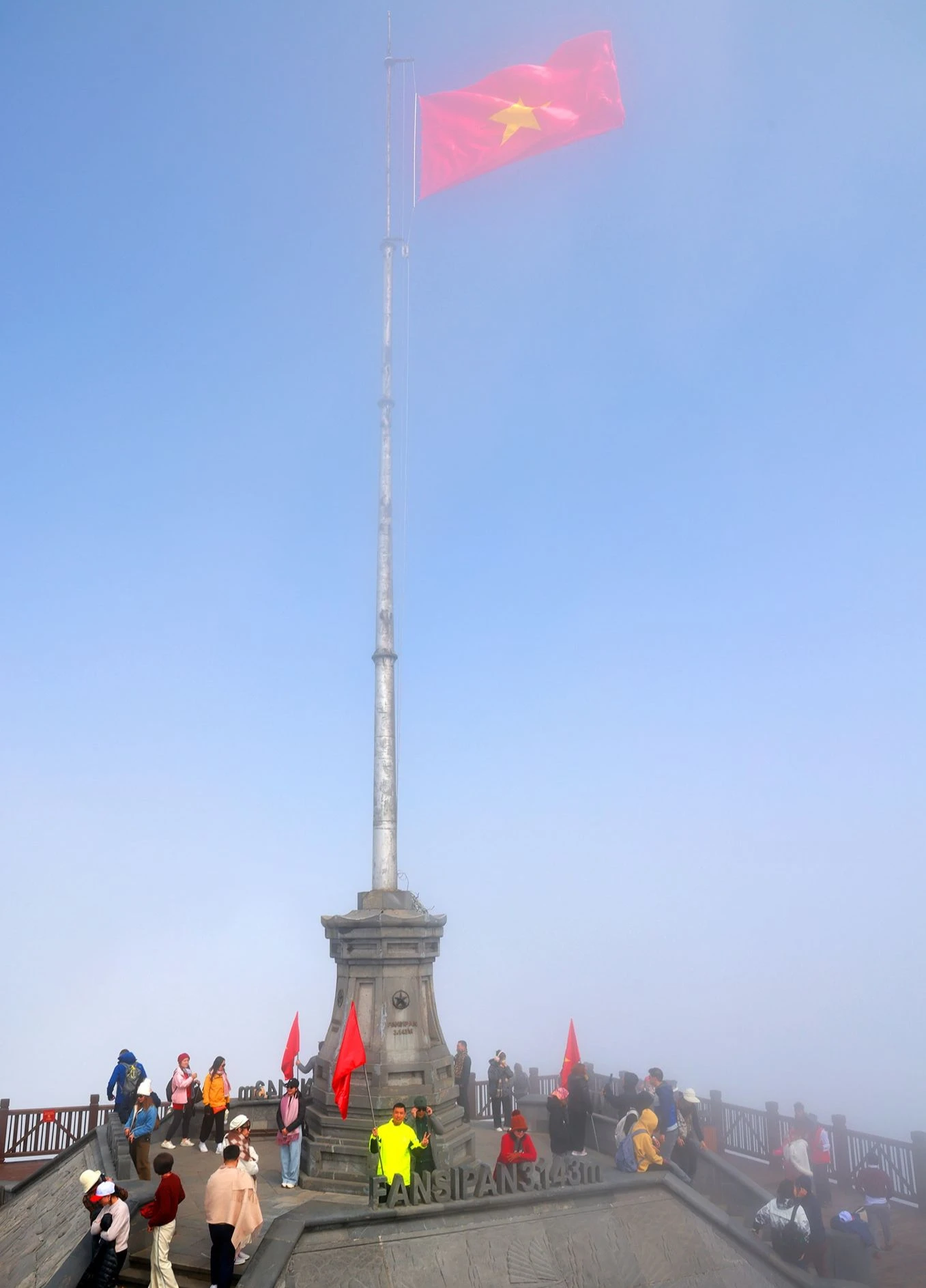 Sacred flag-raising ceremony on Fansipan peak photo 11