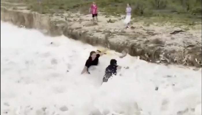 Hundreds of thousands of Australians lose power as Tropical Cyclone Alfred makes landfall