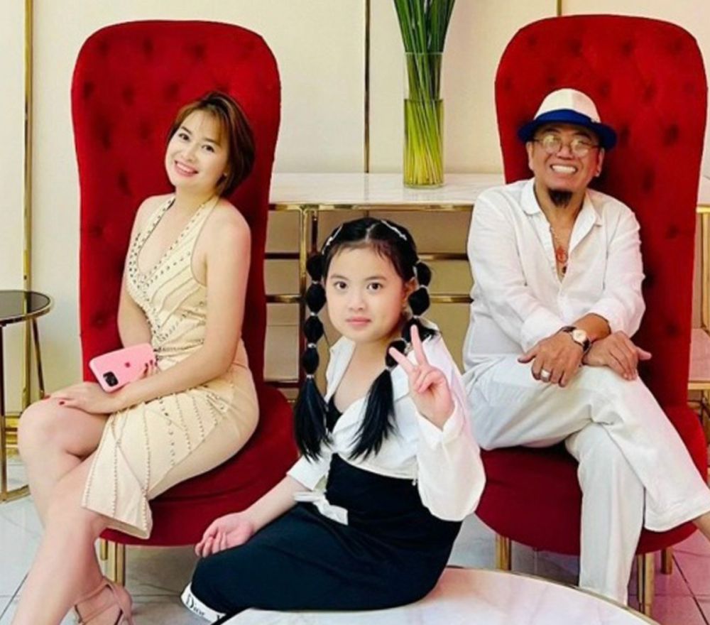 Comedian Hong To with his wife and daughter.