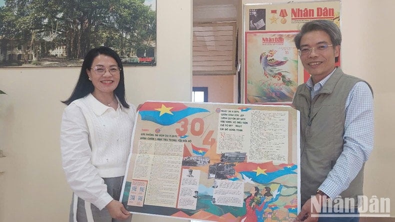 ការបន្ថែមពិសេសនៃកាសែត Nhan Dan មកដល់អ្នកអាននៃតំបន់ខ្ពង់រាបភាគខាងត្បូង រូបថតទី 3