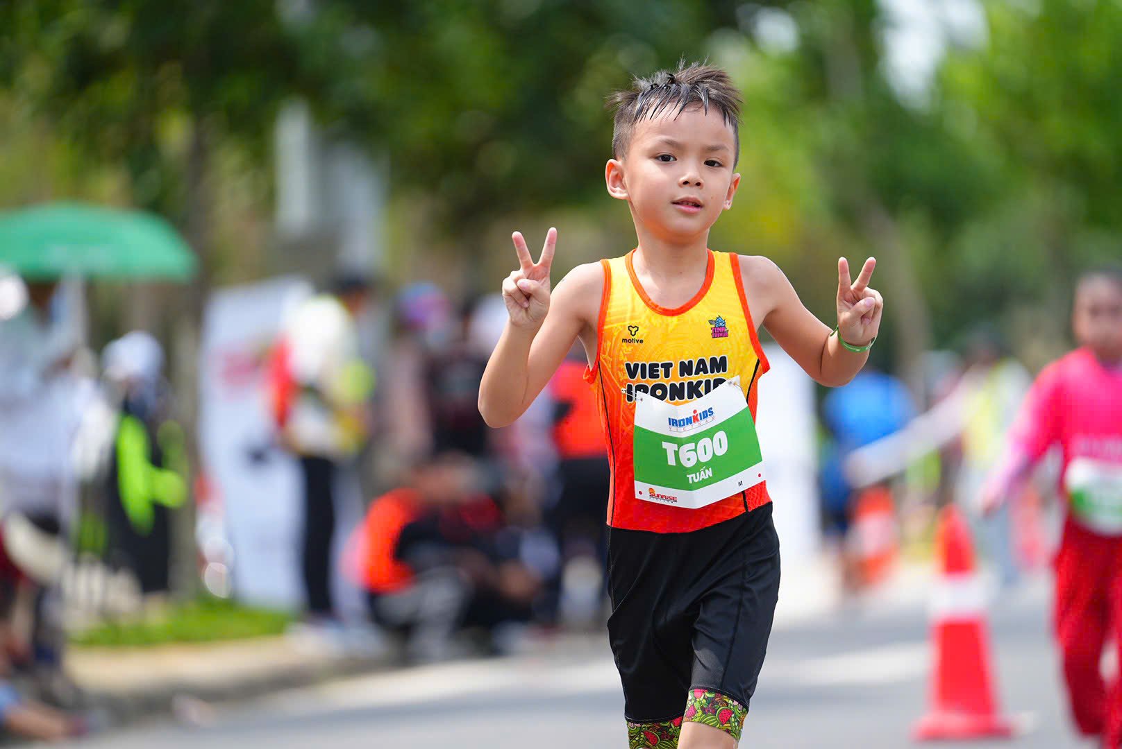 IRONKIDS Đà Nẵng 2025: Những 'người thép nhí' tỏa sáng trên đường đua mùa hè- Ảnh 16.