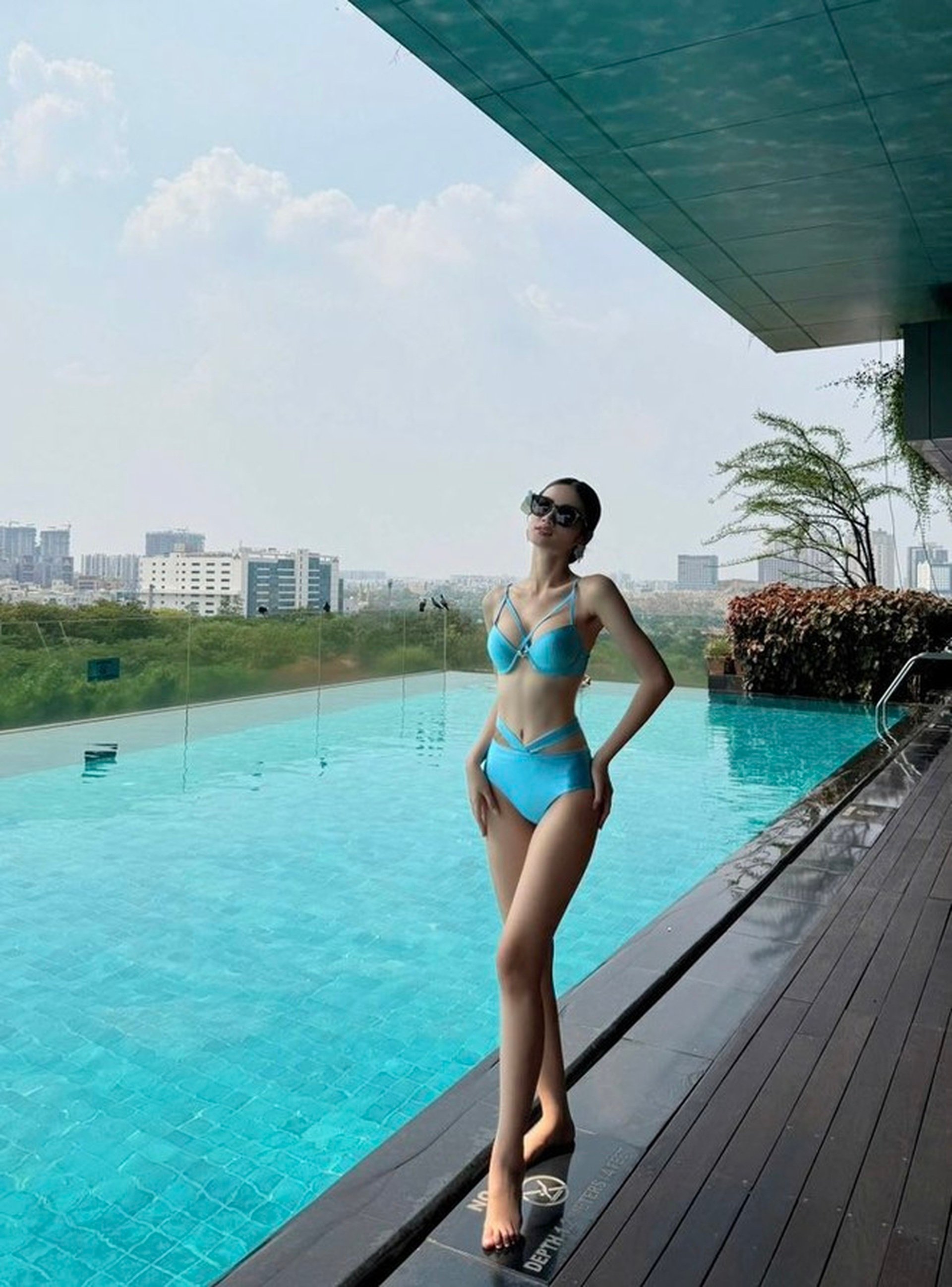 Hoa hậu Ý Nhi diện áo tắm, mang phong cách tinh tế đến Hoa hậu Thế giới - 2