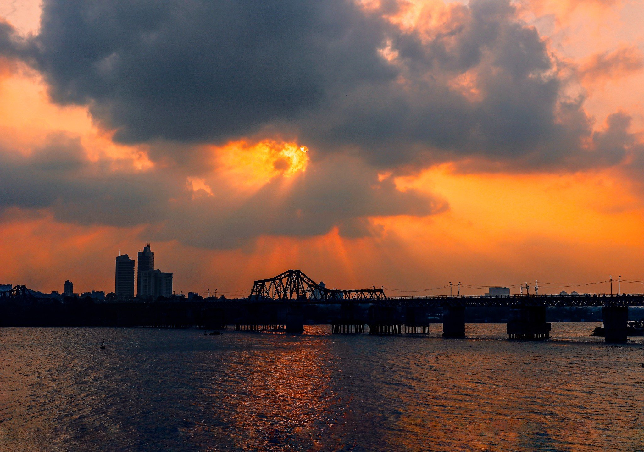 Long Bien Bridge is beautiful in the early summer sunset