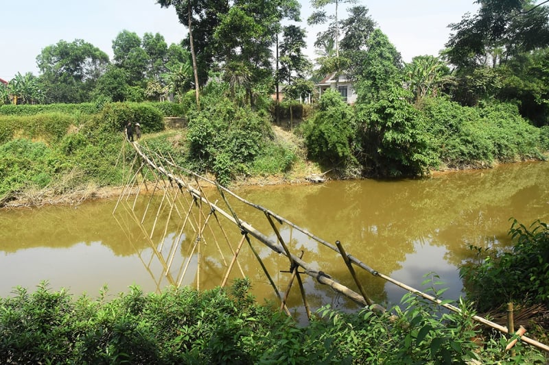Chiếc cầu tre và ước mơ nối đôi bờ sông Nhùng -0